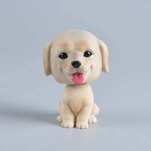 Image of a smiling Yellow Labrador bobblehead