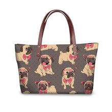 Load image into Gallery viewer, Image of pug bag in pug with pink glasses and bowtie design on brown background