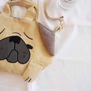 Close image of a pug sling bag