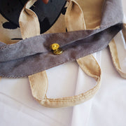 Button image of a pug bag