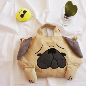Image of pug bag, sling it on your shoulder, or it by the handles
