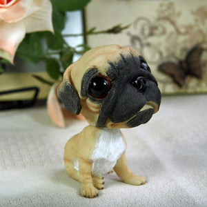 Image of an adorable realistic and lifelike Pug bobblehead