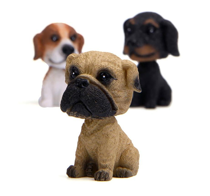 Image of three bobbleheads including Dachshund, Beagle, and Pug bobblehead
