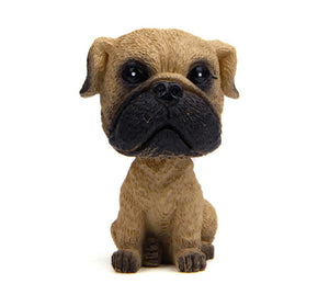 Image of a super cute miniature pug bobblehead