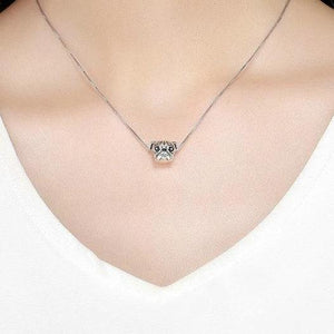 Image of a lady wearing Pug charm necklace