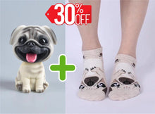 Load image into Gallery viewer, Image of pug gifts bundle with smiling pug bobblehead and pug socks