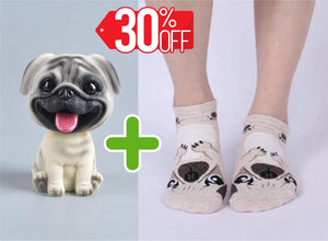 Image of pug gifts bundle with smiling pug bobblehead and pug socks