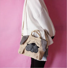 Load image into Gallery viewer, Image of a girl holding pug handbag