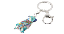 Load image into Gallery viewer, Image of a sitting Pug keyring in the color blue