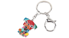 Load image into Gallery viewer, Image of a sitting multicolor Pug keyring made of enamel