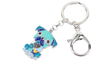 Load image into Gallery viewer, Image of a sitting blue Pug keyring made of enamel