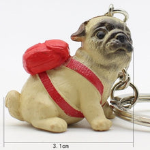 Load image into Gallery viewer, Size image of an adorable Pug keyring wearing a red backpack