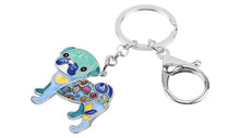 Load image into Gallery viewer, Image of a enamel Pug keyring in the color blue
