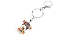Load image into Gallery viewer, Image of a sitting brown Pug keyring made of enamel