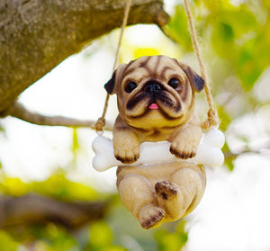 Image of a super cute hanging Pug statue
