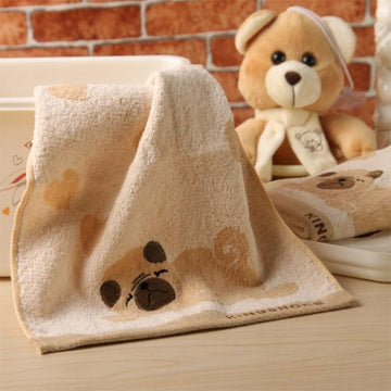 Image of pug towel in the color brown