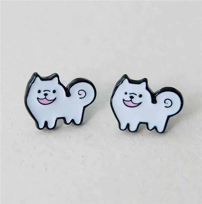Image of two super cute Samoyed earrings in metal