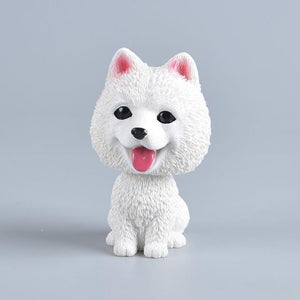 Image of a samoyed bobblehead on a gray background