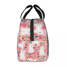 Load image into Gallery viewer, Side image of an insulated Samoyed lunch bag with exterior pocket in bloom design