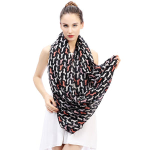 Image of a girl wearing and flaunting a beautful sausage dog scarf