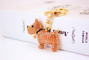 Image of an adorable stone-studded Schnauzer keychain in brown color