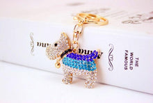 Load image into Gallery viewer, Image of an adorable stone-studded Schnauzer keychain in white  and blue color