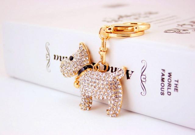Image of an adorable stone-studded Schnauzer keychain in white color