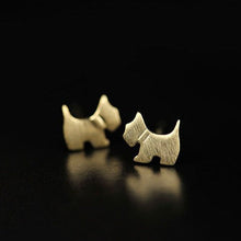 Load image into Gallery viewer, Image of two schnauzer earrings made of silver in gold color