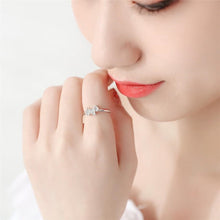 Load image into Gallery viewer, Image of a lady wearing silver Schnauzer ring in sparkling white-stone studded Schnauzer design