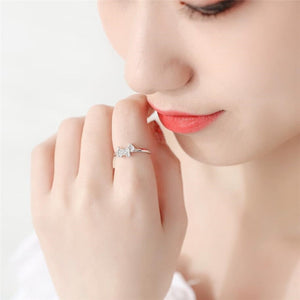 Image of a lady wearing silver Schnauzer ring in sparkling white-stone studded Schnauzer design
