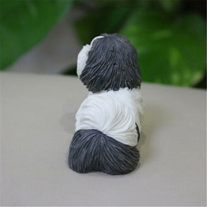 Back image of a super cute Shih Tzu figurine in Black and White color