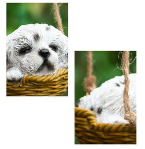 Close image of a super cute sleeping and hanging Shih Tzu garden statue