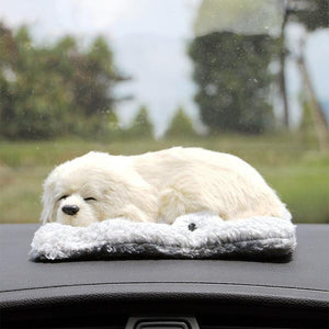 Image of an adorable sleeping Samoyed car air freshener