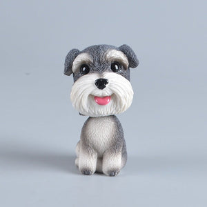 Image of a smiling Schnauzer bobblehead