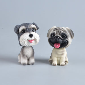 Image of a smiling Schnauzer and Pug bobblehead