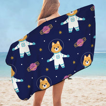 Load image into Gallery viewer, Image of a lady flaunting Shiba Inu beach towel in spaceman Shiba Inu design