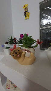 Image of a super cute pug flower pot