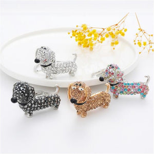 Image of stone-studded Dachshund keychains in four colors including Black, White, Brown, and Multicolor