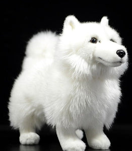 Side image of an adorable stuffed American Eskimo Dog plush toy in the color white