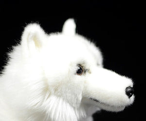 Side face image of an adorable stuffed American Eskimo Dog plush toy in the color white