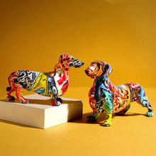 Load image into Gallery viewer, Image of two dachshund statues
