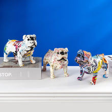 Load image into Gallery viewer, Image of three english bulldog statues in different colors - front view