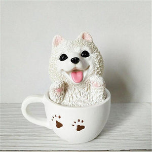 Image of a smiling teacup American Eskimo Dog ornament