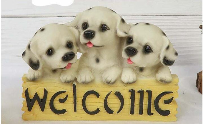 image of three dalmatians welcome statue 