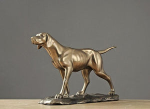 Image of a golden weimaraner statue made of brass and resin
