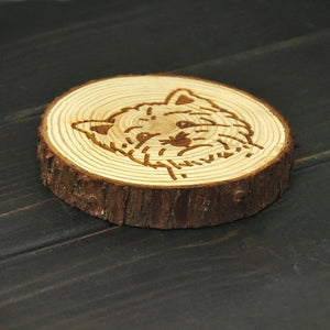 Side image of a wood-engraved West Highland Terrier coaster design
