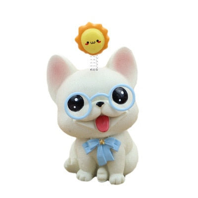 Image of french bulldog bobblehead in the smiling White Frenchie babyface, wearing sky blue glasses, a matching bow-tie, with a bouncy yellow sun on his or her mind