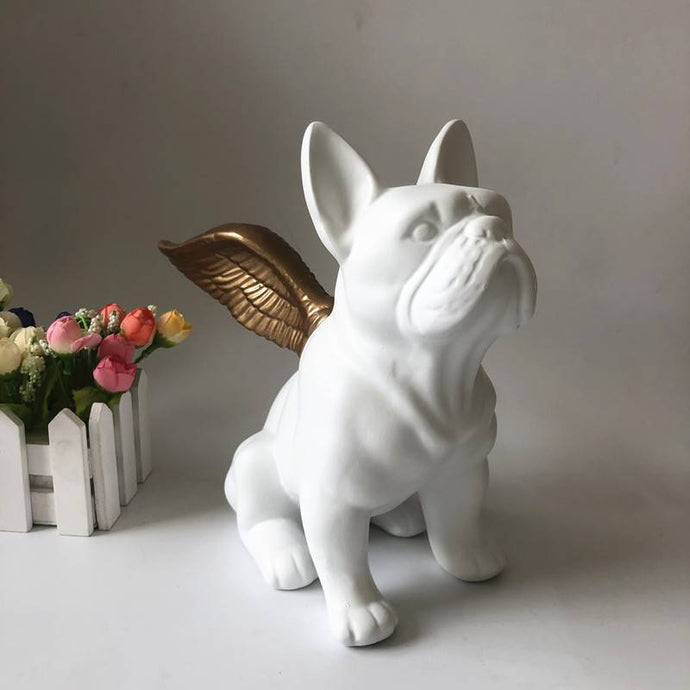 Image of a white french bulldog statue with Golden Angel Wings, made of black ceramic, with gold-plated angel wings