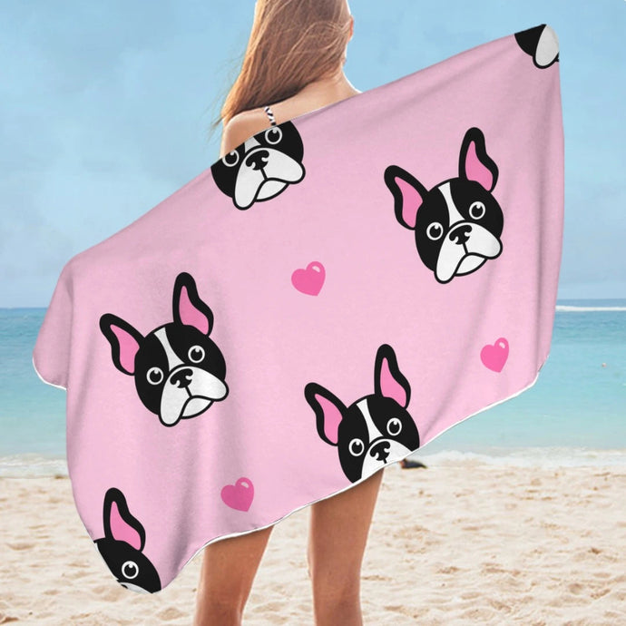Image of a lady flaunting Boston Terrier beach towel at the beach in pink color Boston Terriers with hearts design