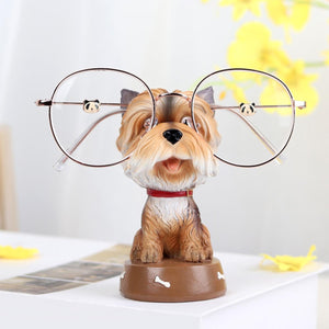 Image of a smiling Yorkie glasses holder made of resin